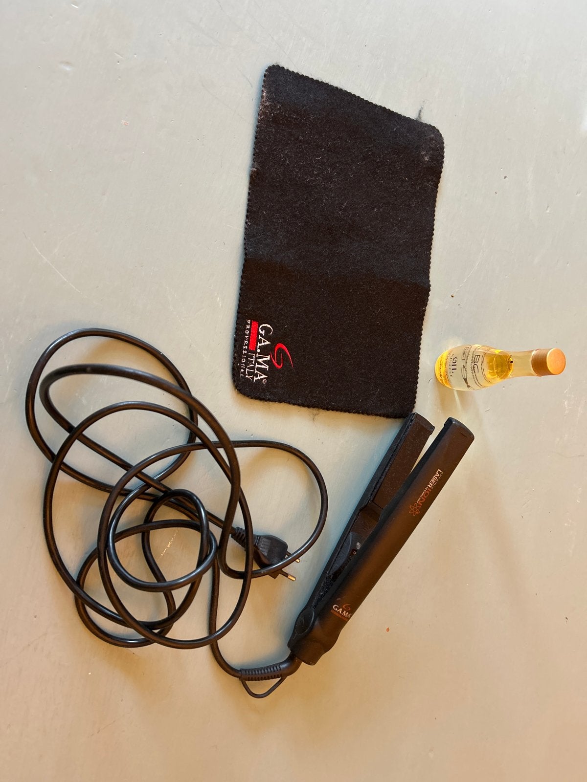 GA.MA Laser Ion stijltang met hittebestendig matje en olie, Ophalen of Verzenden, Zo goed als nieuw, Haarverzorging