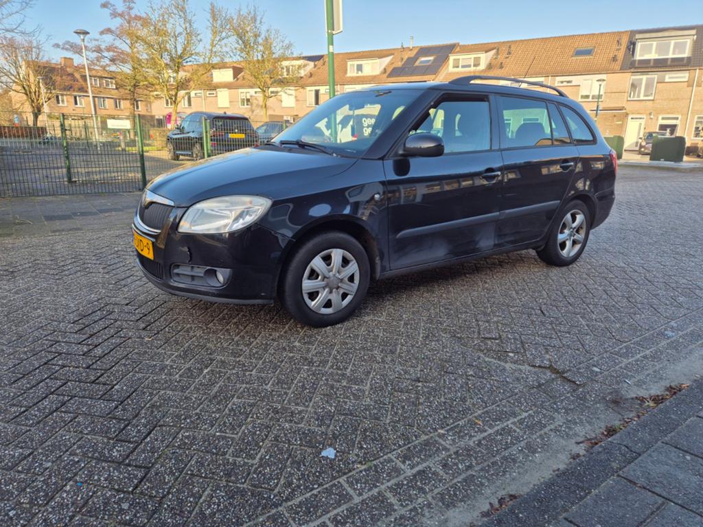 Skoda Fabia Combi 1.4/2009/clima/stationwagon, Auto's, Skoda, Voorwielaandrijving, 86 pk, Zwart, Elektrische ramen