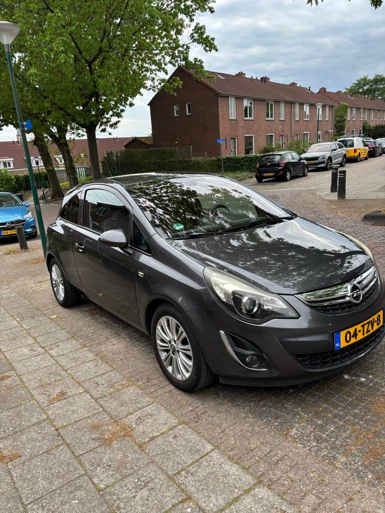 Opel Corsa 1.4 16V 3D 2012 Grijs, Auto's, Opel, Particulier, Corsa, ABS, Airbags, Airconditioning, Automatische klimaatregeling