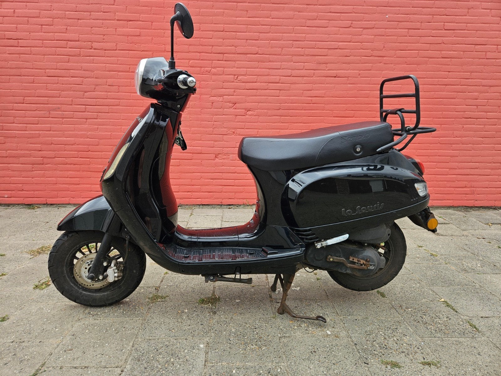 Scooter met onderhoudshistorie en lichte schade, Ophalen