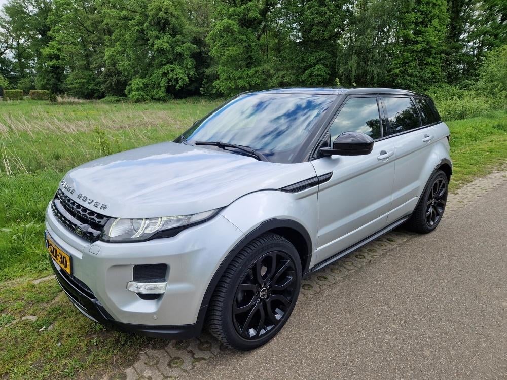 Land Rover Range Rover Evoque 2.2 SD4 4WD AUT 2014 Grijs, Auto's, Automaat, 1800 kg, Zwart, Diesel