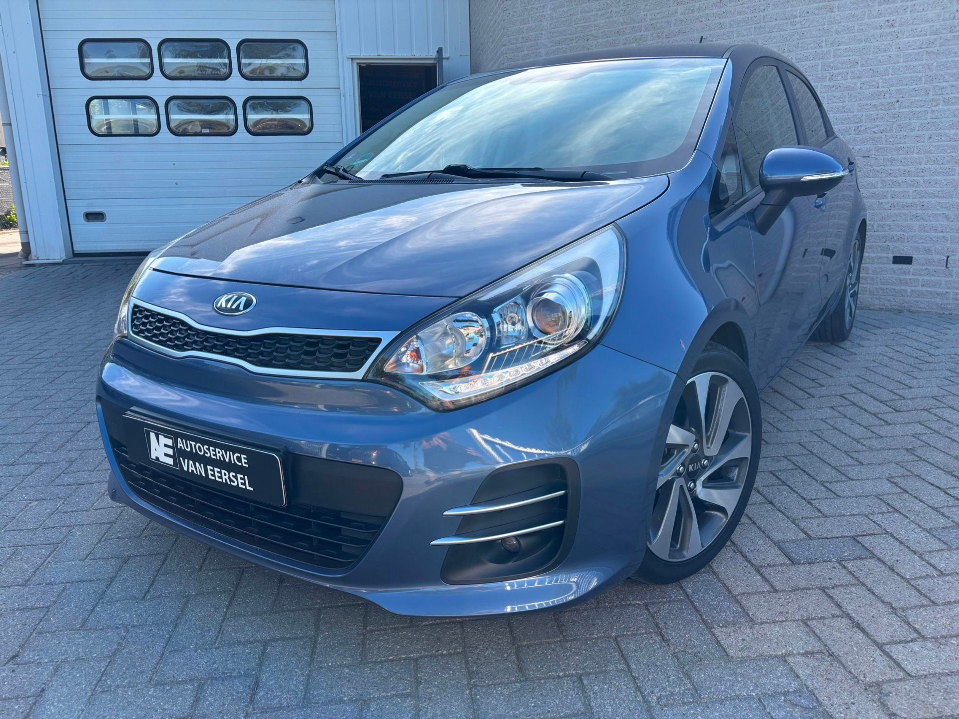 Kia Rio 1.2 CVVT ExecutiveLine TREKH.AFNB/PDC/A.UITRIJCAM/NA, Auto's, 1027 kg, Euro 6, 4 cilinders, Blauw