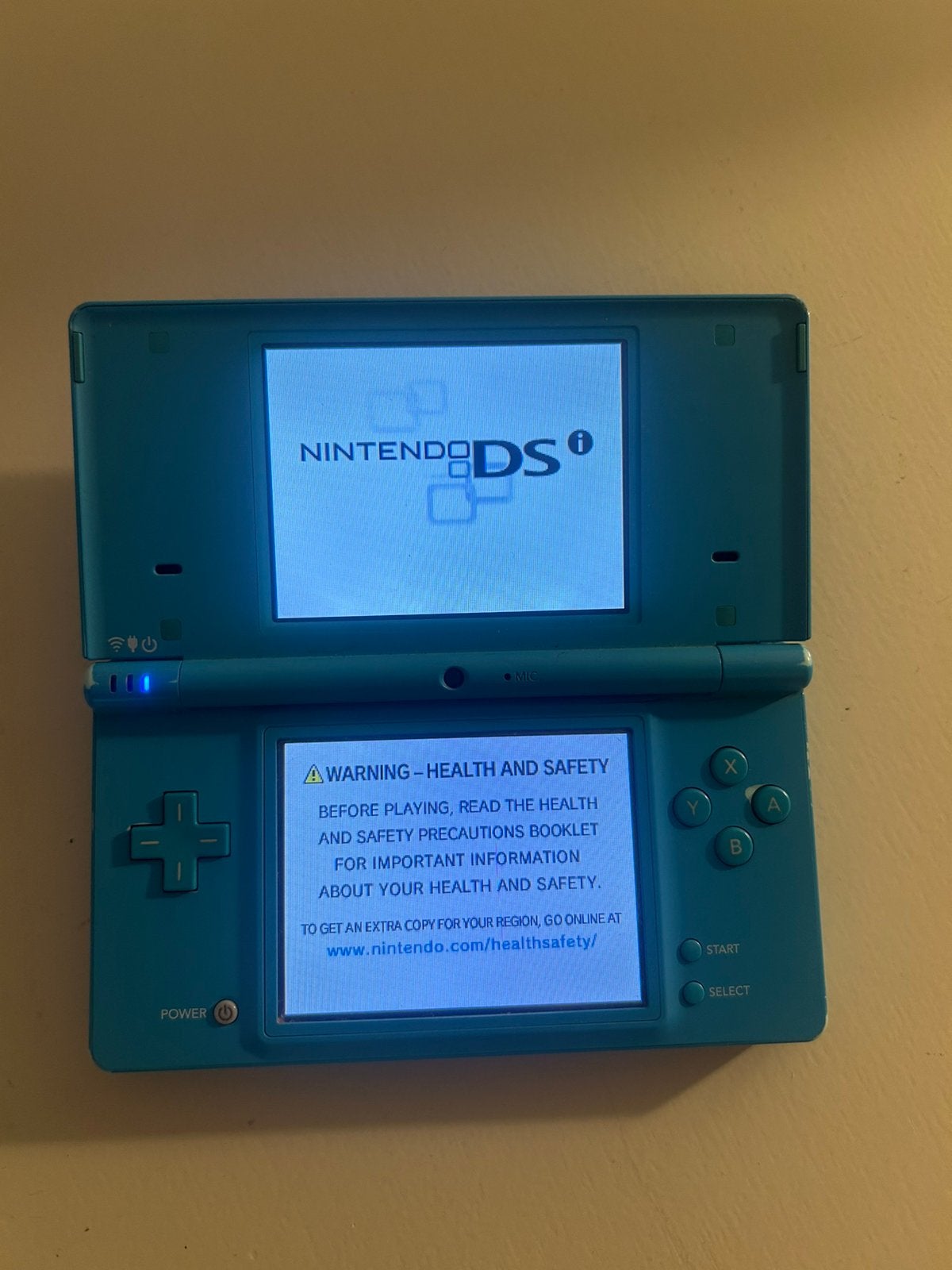Nintendo DSi Lichtblauw, Spelcomputers en Games, Spelcomputers | Nintendo DS, Gebruikt, Dsi, Blauw, Met beschermhoes of tas, Ophalen of Verzenden