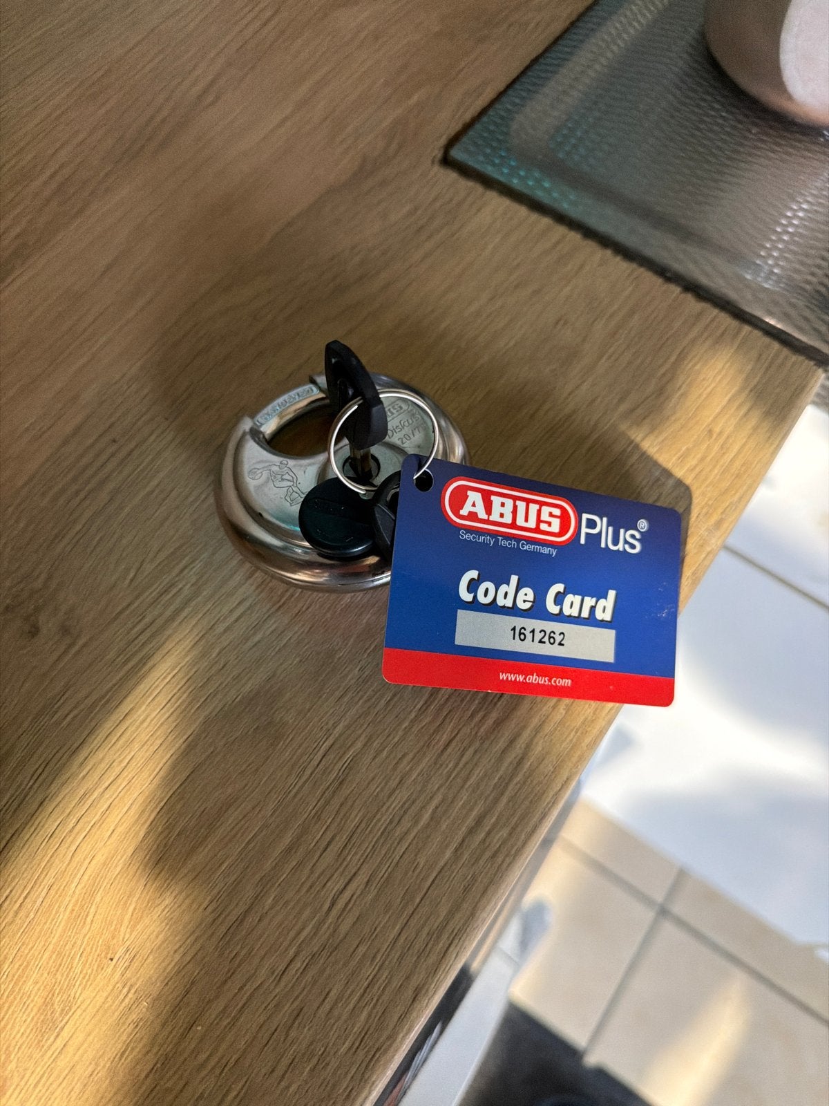 ABUS Plus schijfhangslot met codekaart en sleutels, Ophalen of Verzenden, Zo goed als nieuw