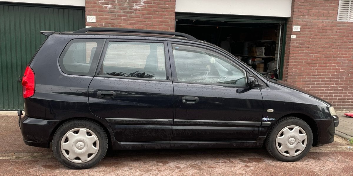 Mitsubishi 2004 Zwart LPG  G3 zonder APK, 1160 kg, Zwart, 98 pk, 1200 kg