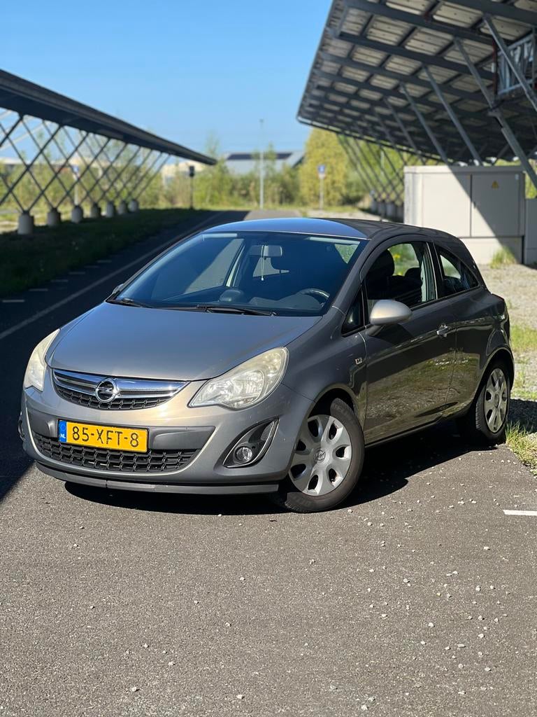 Opel Corsa 1.3 Cdti 2012 Bruin APK, Auto's, Voorwielaandrijving, Euro 5, 1063 kg, Zwart