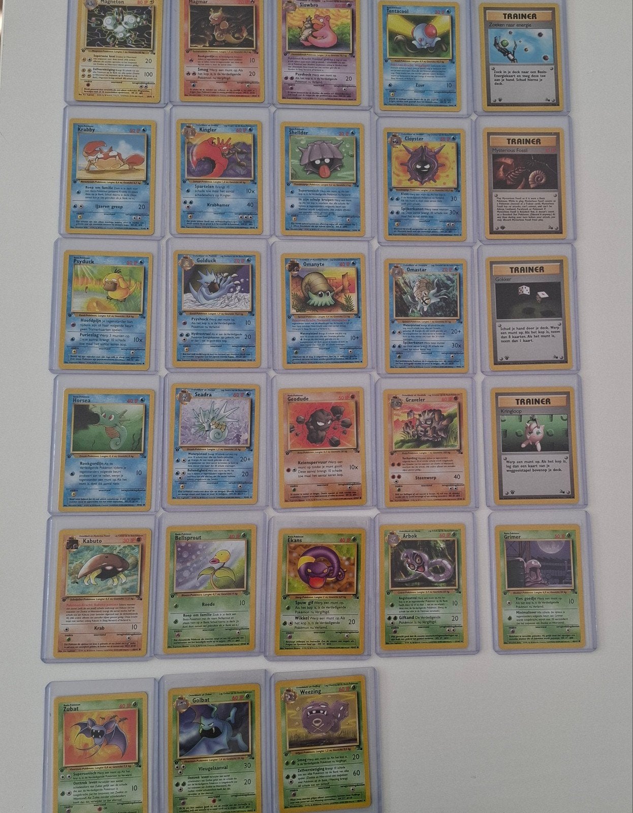 28 first edition base set fossil pokemon kaarten NM, Ophalen of Verzenden, Gebruikt, Meerdere kaarten