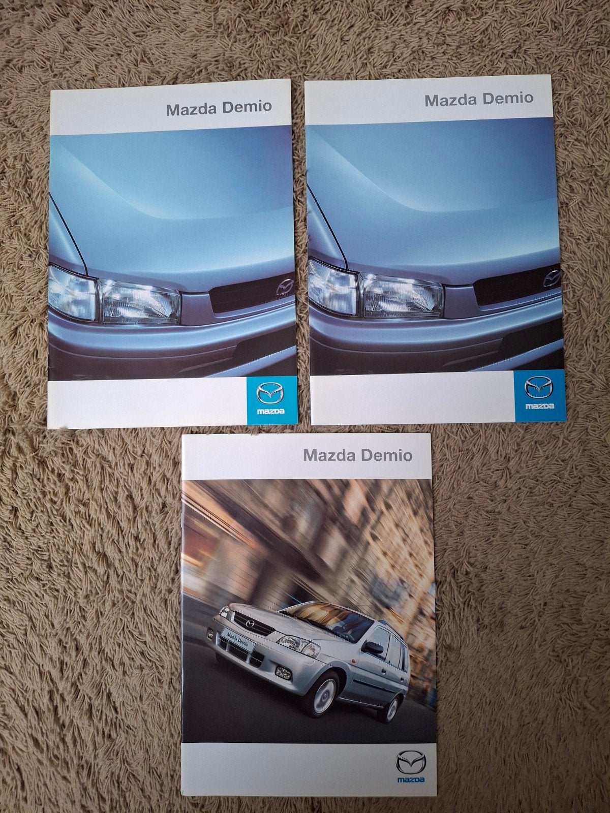 3x autofolder Mazda Demio, Verzenden, Mazda