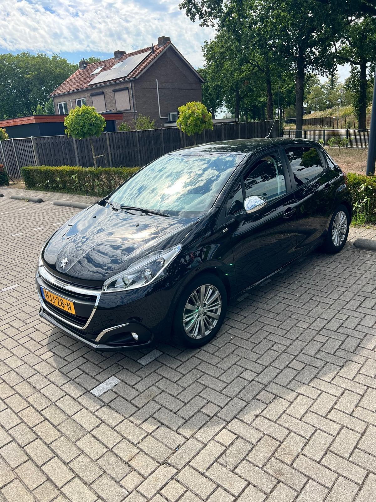 Peugeot 208 1.2 VTI 60KW/82PK 5-D 2017 Zwart, Auto's, Voorwielaandrijving, Stof, Zwart, 1199 cc
