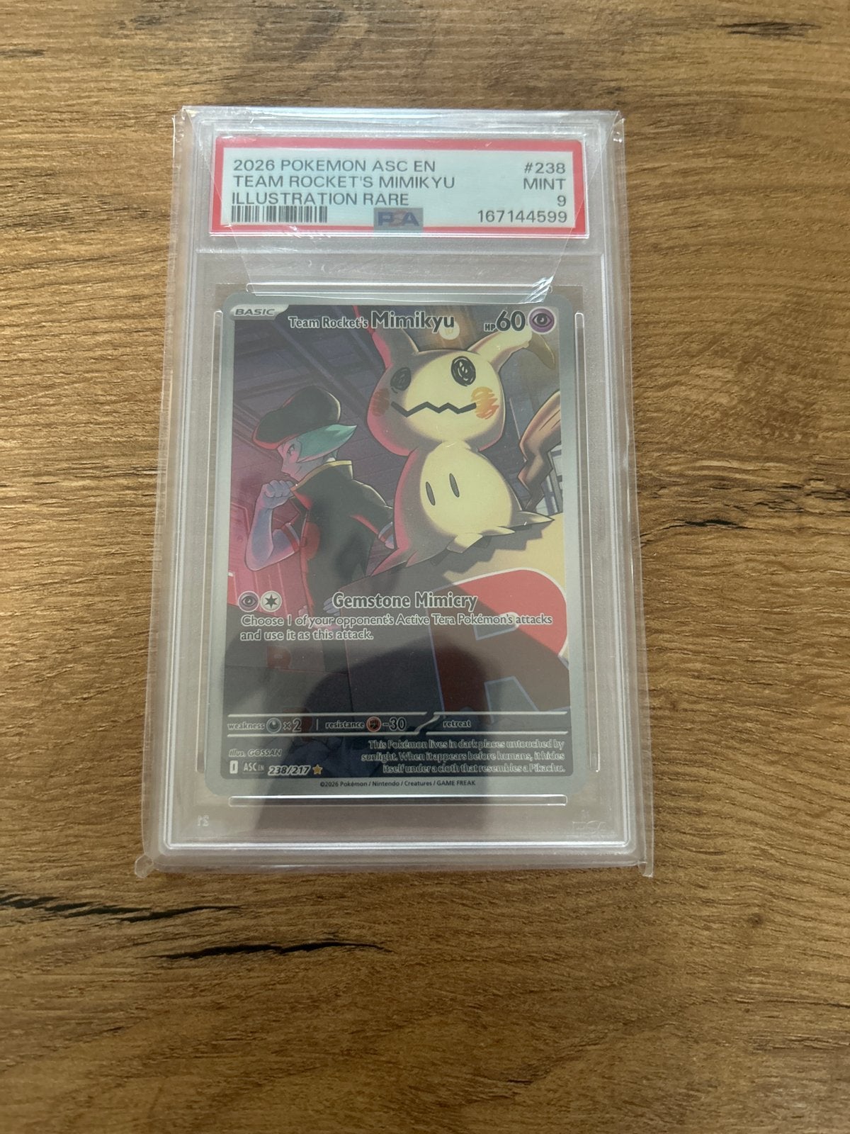 PSA 9 Team Rocket's Mimikyu Pokémon kaart, Verzenden, Zo goed als nieuw, Losse kaart
