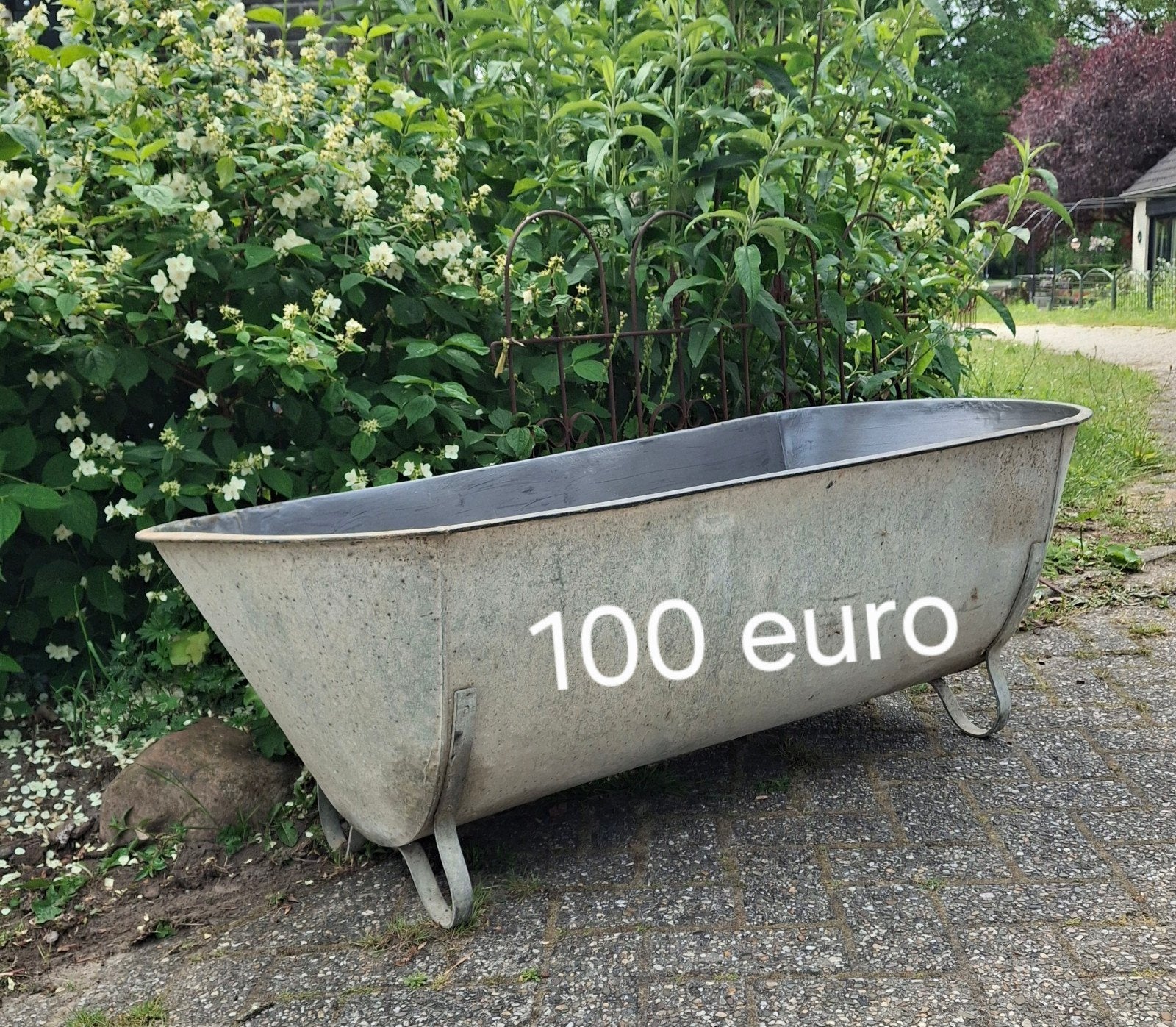 Prachtig zinken ligbad, Ophalen