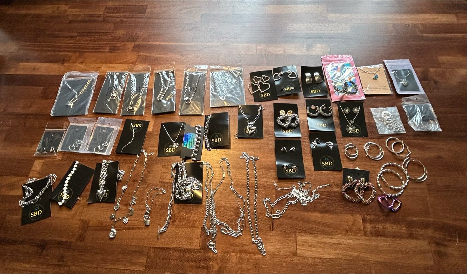 Grote partij nieuwe RVS sieraden: oorbellen, kettingen, armb, Ophalen of Verzenden, Nieuw, Zilver, Staal