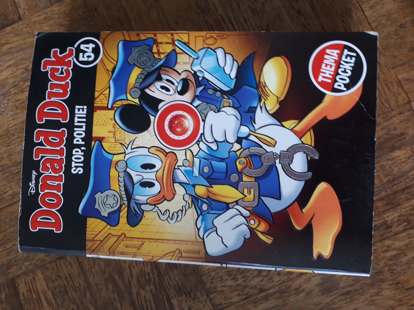 Donald Duck Thema Pocket 54: Stop, Politie!, Eén stripboek, Ophalen of Verzenden, Gelezen