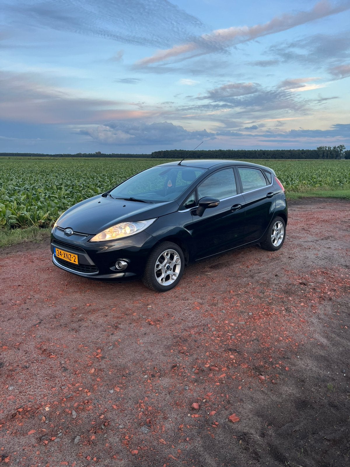 Ford Fiësta 1.25 44KW 5DR 2012 Zwart, Auto's, Ford, Voorwielaandrijving, 1242 cc, 4 cilinders, Zwart