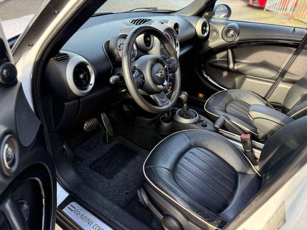 Mini Mini Countryman 1.6 Cooper S ALL4 Chili Automaat Pano D, Auto's, Mini, Euro 5, 1380 kg, Gebruikt, Zwart
