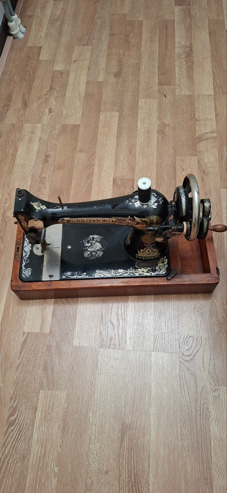 oude singer naaimachine, Ophalen