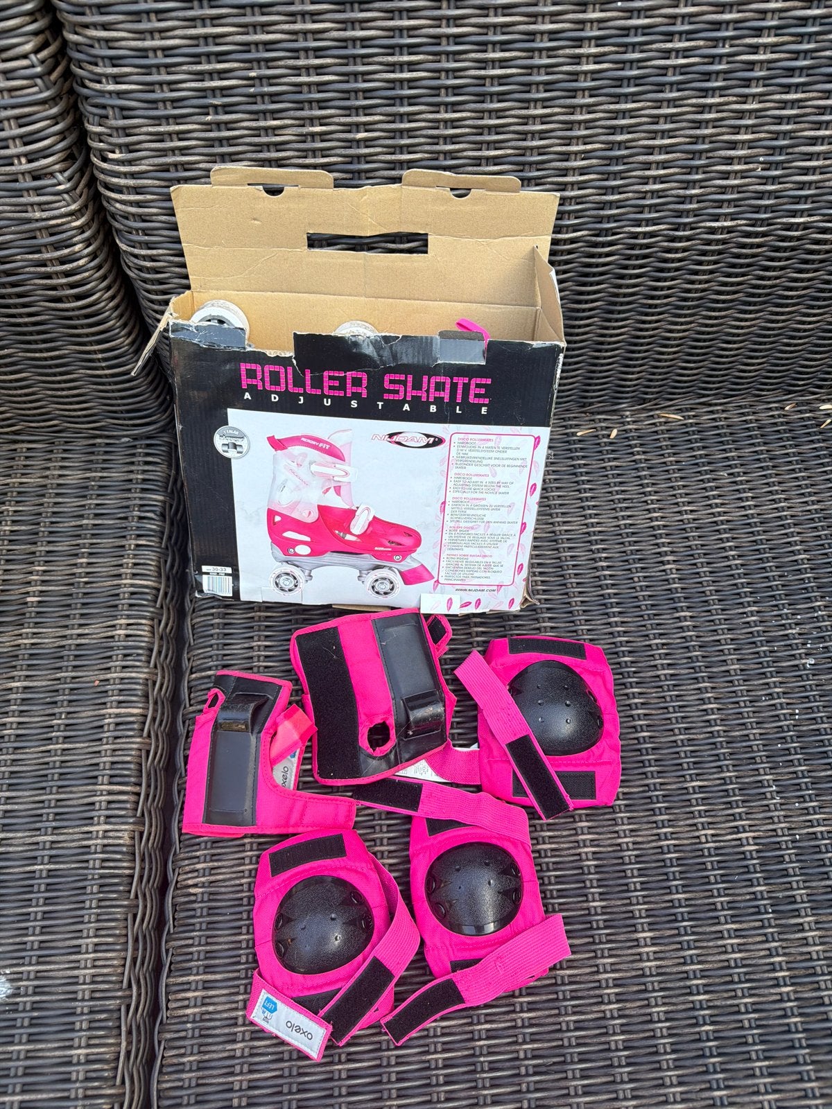 Roze verstelbare rolschaatsen met beschermset, Ophalen of Verzenden, Verstelbaar, Gebruikt, Kinderen