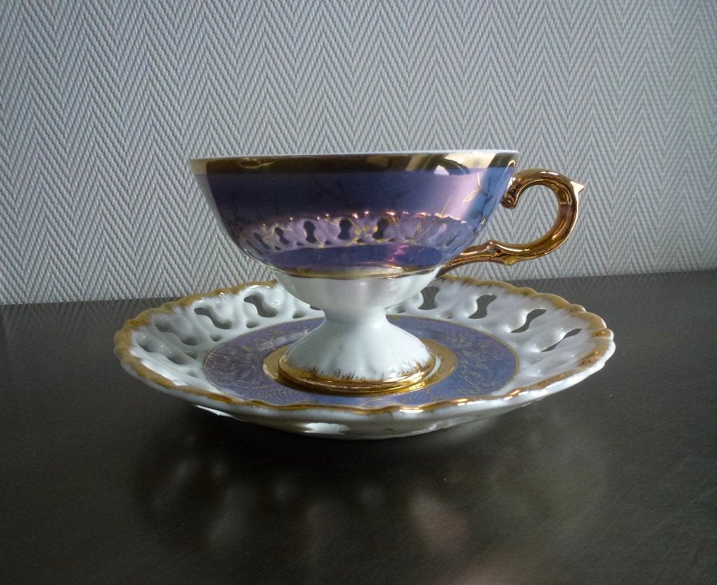 Antieke KPM Japan Lusterware kop & schotel, iriserend blauw, Antiek en Kunst, Ophalen of Verzenden