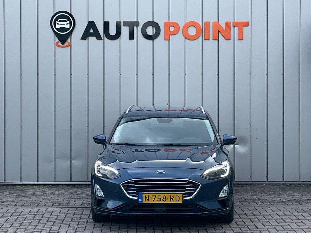 Ford Focus Wagon 1.0 Titanium X Business AUTOMAAT 1E EIG DEA, Auto's, Ford, 1328 kg, Gebruikt, Euro 6, Blauw