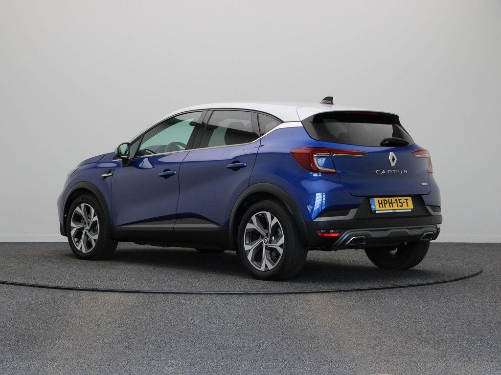 Renault Captur E-Tech Hybrid 145pk R.S. Line | Achteruitrijc, Auto's, Renault, Gebruikt, 715 kg, Blauw, Leder en Stof