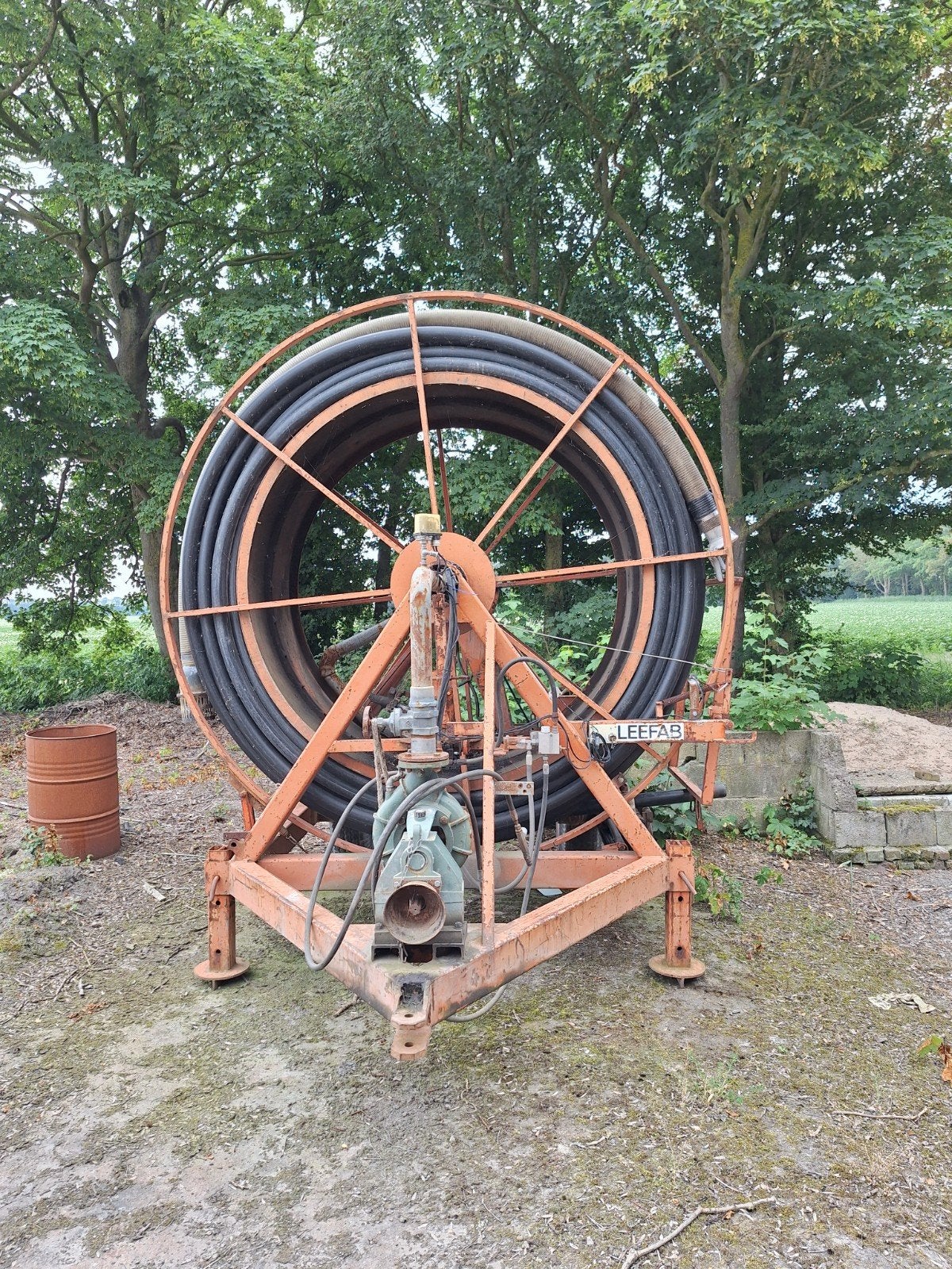 Defecte Leefab regenhaspel voor onderdelen met slang en pomp, Ophalen, Beregening en Drainage