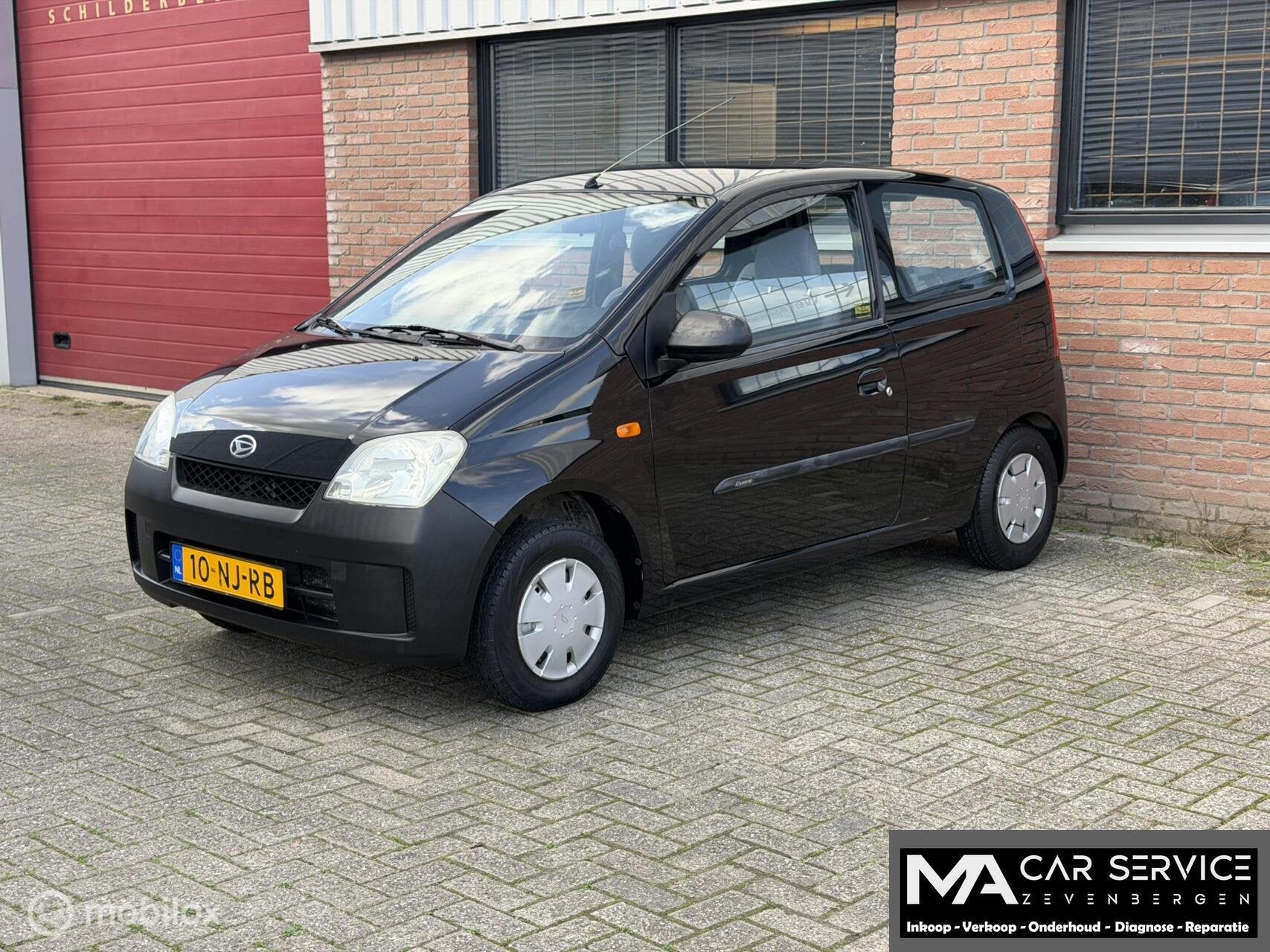 Daihatsu Cuore 1.0-12V Kyoto, Auto's, Voorwielaandrijving, 18 €/maand, Cuore, Zwart