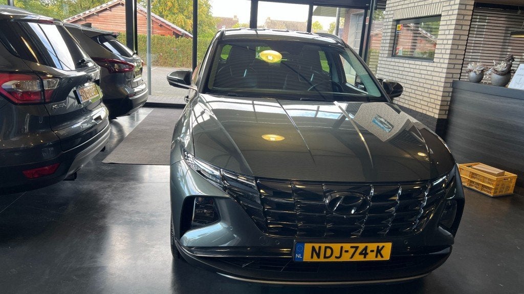Hyundai TUCSON 1.6 T-GDI HEV Premium 230 Pk Automaat 1650 kg, Auto's, Gebruikt, Huisgarantie, 4 cilinders, Met garantie (alle)