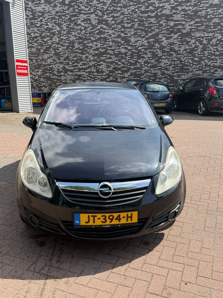 Opel Corsa 1.2 16V 5D 2007 Zwart, Auto's, Voorwielaandrijving, Zwart, 4 cilinders, Overige bekleding