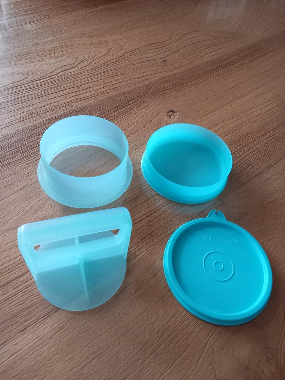 Tupperware hamburgerpers  - Lichtblauw, Huis en Inrichting, Keuken | Tupperware, Ophalen of Verzenden, Nieuw, Blauw, Overige typen
