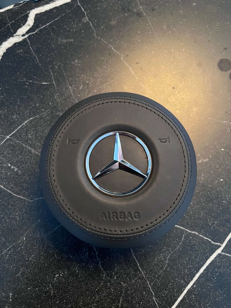 Mercedes airbag cover leer zwarte stiksels chroom ster