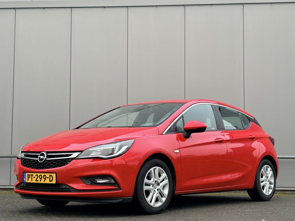 Opel Astra 1.0 Online - trekhaak - navi - airco - nap! - cru, Auto's, Opel, Gebruikt, Euro 6, 610 kg, 23 km/l