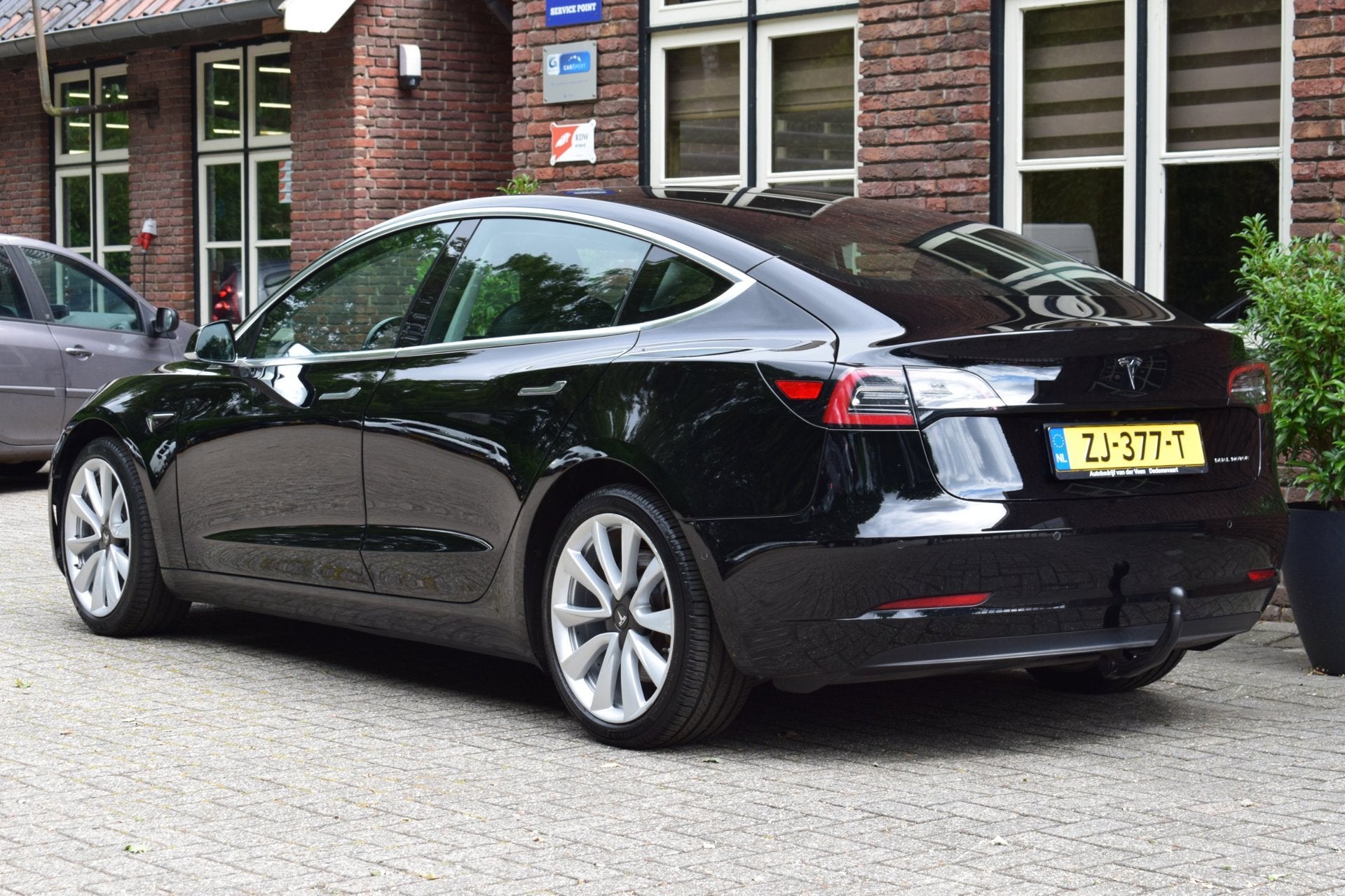 Tesla Model 3 Long Range AWD 75 kWh Trekhaak, Automaat, 910 kg, Met garantie (alle), Zwart