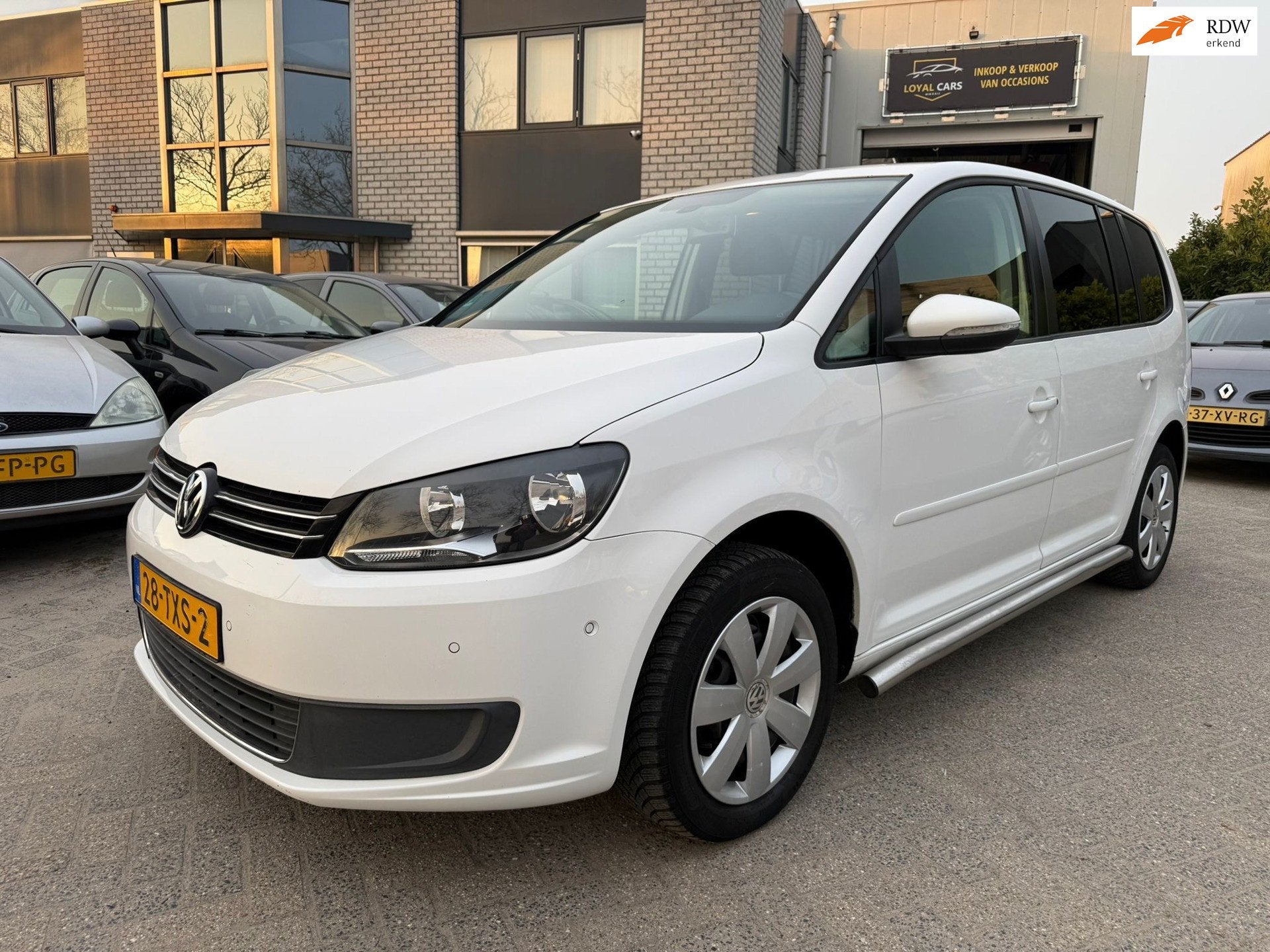 Volkswagen Touran 2.0 TDI Comfortline BlueMotion Automaat Tr, Auto's, Euro 5, Stof, Zwart, 4 cilinders