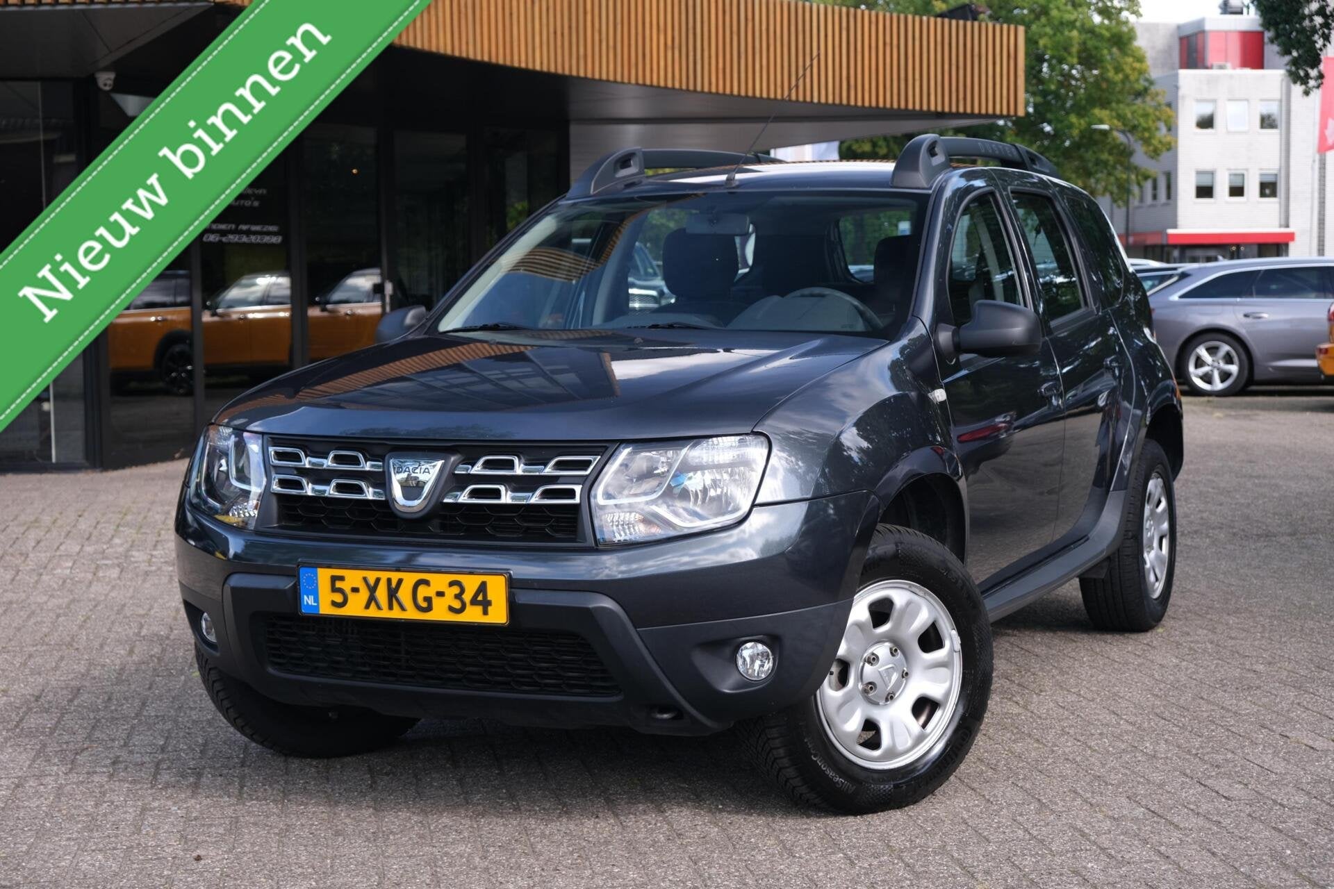 Dacia Duster 1.2 TCe 4x2 Lauréate|Rijklaar!|Trekhaak|Cruise, Auto's, Voorwielaandrijving, Gebruikt, Zwart, Duster