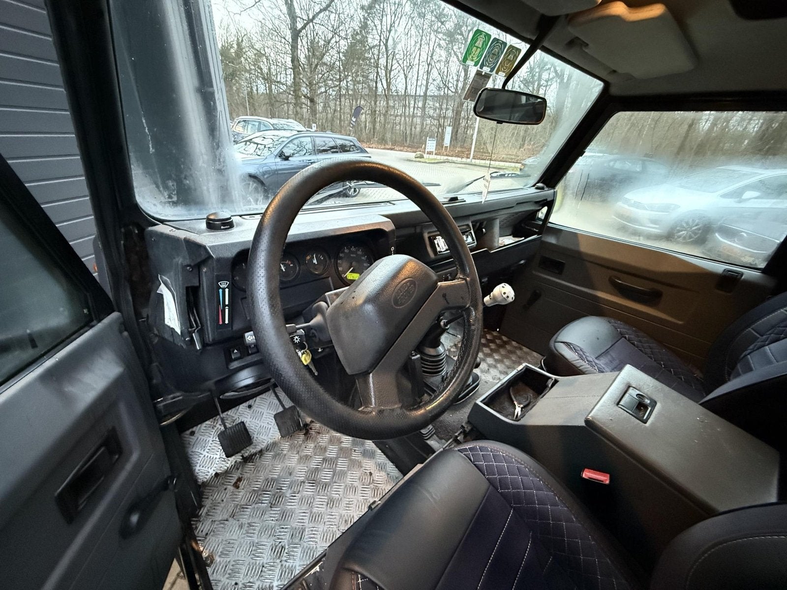 Land Rover Defender 2.5 110 Td5 County (bj 2000), Auto's, Oldtimers, Stof, Land Rover, 2495 cc, Bedrijf