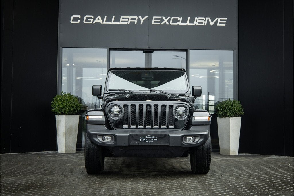Jeep Wrangler Unlimited 4xe 380 Sahara - Camera | Stoel & St, Auto's, Jeep, Automaat, 4 cilinders, Cabriolet, Bedrijf