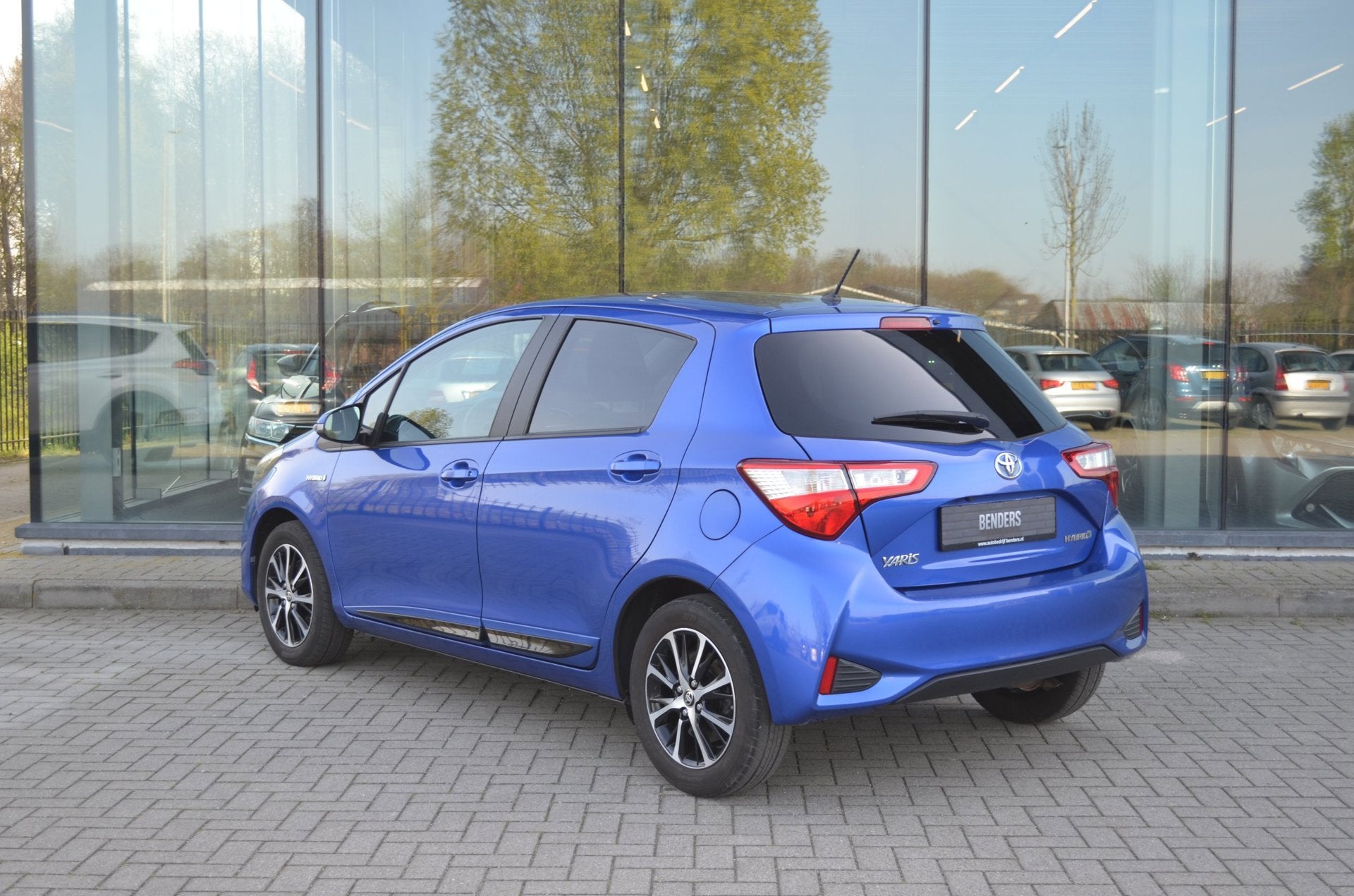 Toyota Yaris 1.5 Hybrid Dynamic | Cruise | stoel verw. | Cam, Auto's, Stof, Zwart, Overige carrosserieën, Blauw