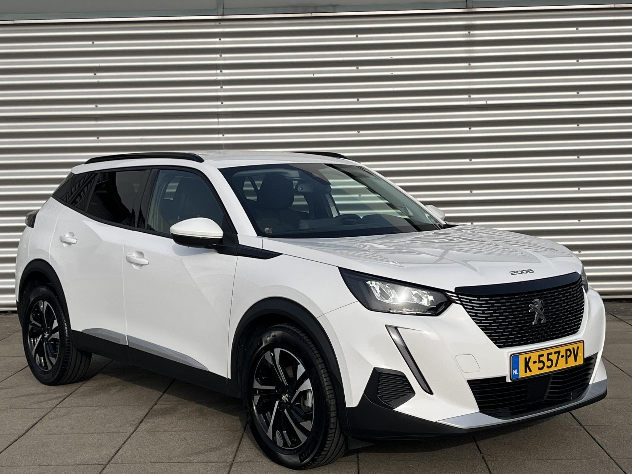 Peugeot 2008 1.2 PureTech Allure | Cruise Control | Navigati, Auto's, Voorwielaandrijving, Gebruikt, Euro 6, 1199 cc