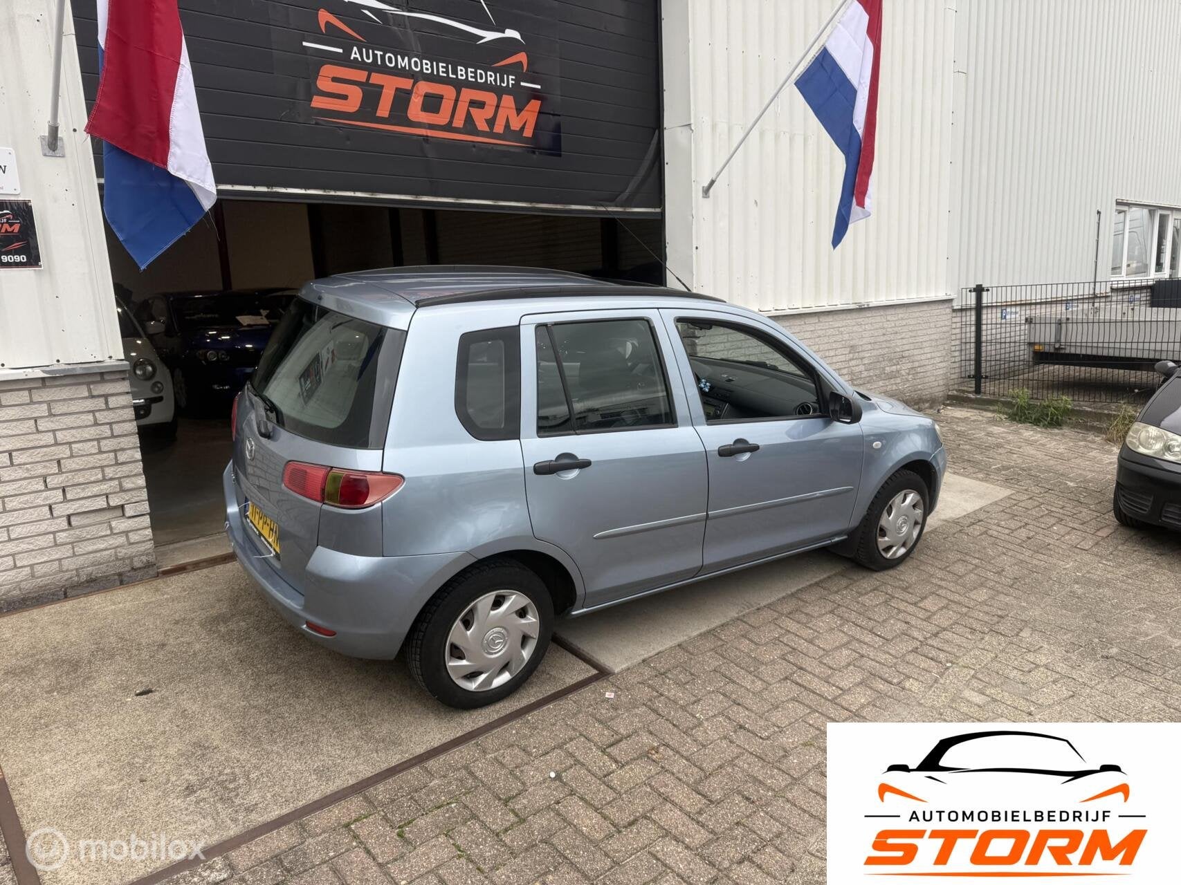 Mazda 2 1.4 Exclusive, Auto's, 15 km/l, 4 cilinders, Blauw, Bedrijf