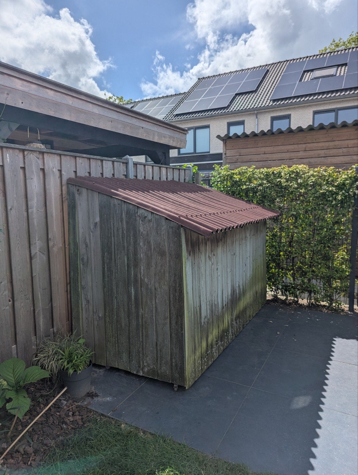 Verrijdbare houten stalling voor fietsen of motor, Ophalen