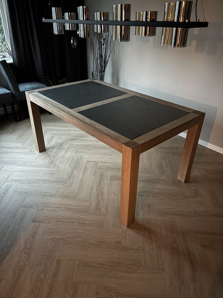 Stijlvolle eettafel met houten frame en donker blad, Ophalen, Gebruikt, 100 tot 150 cm, 50 tot 100 cm