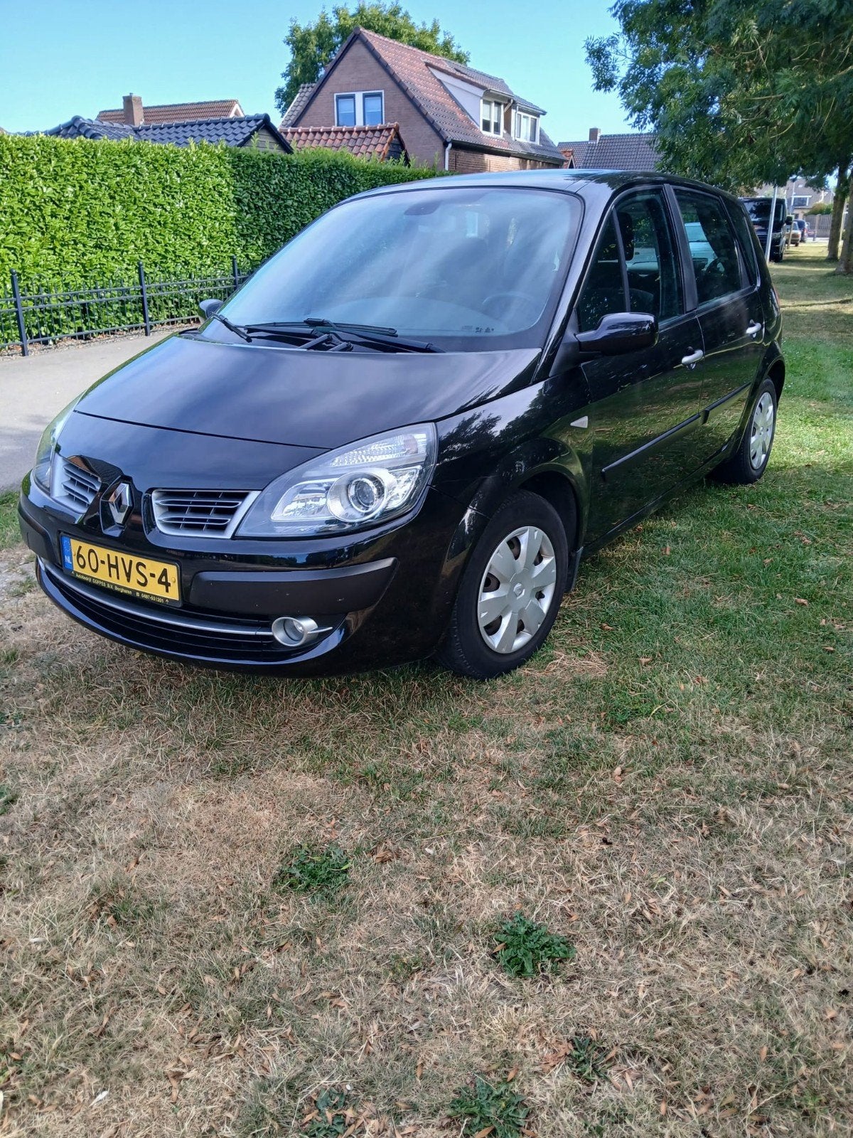 Renault Scénic 1.6 16V 82KW 2009 Zwart, Auto's, Renault, Stof, 1295 kg, 4 cilinders, Zwart