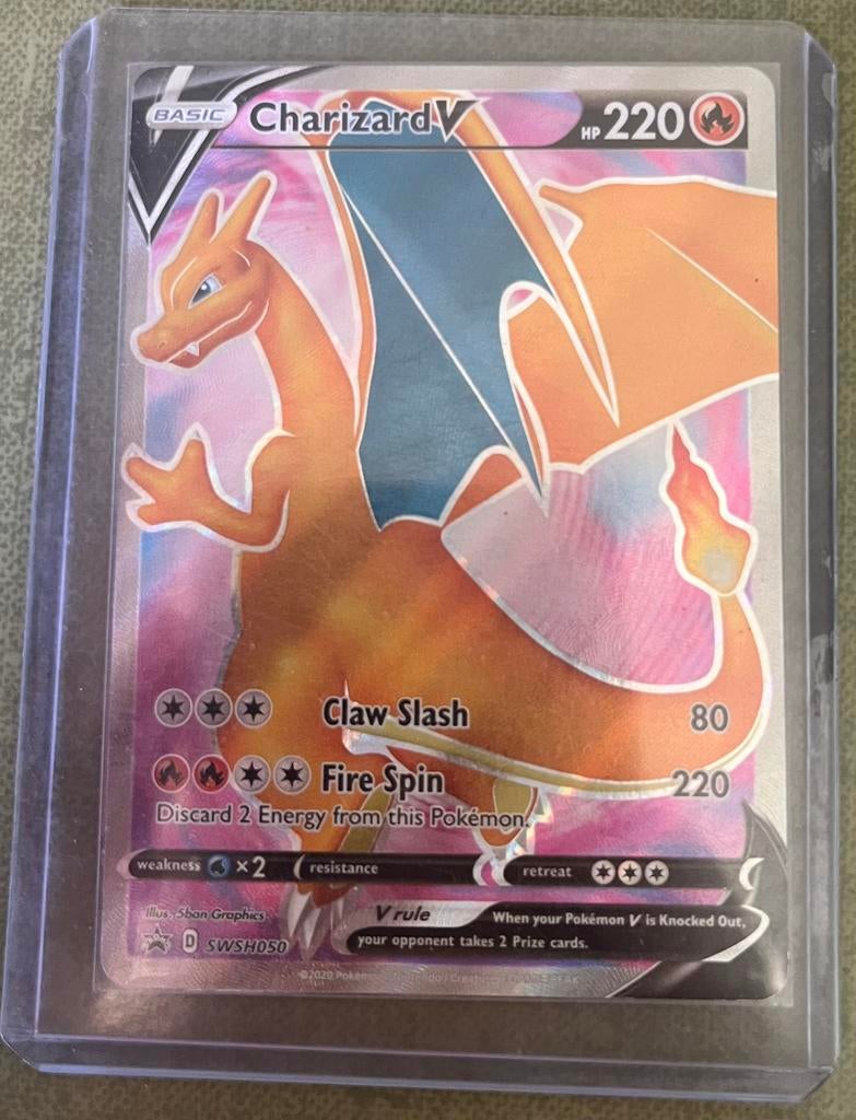 Charizard V promo | SWSH050 | Near Mint, Ophalen of Verzenden, Zo goed als nieuw, Meerdere kaarten