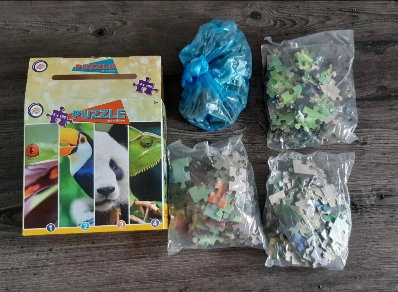 4x100 stukjes puzzel: Kikker, Toekan, Panda, Kameleon, Ophalen of Verzenden