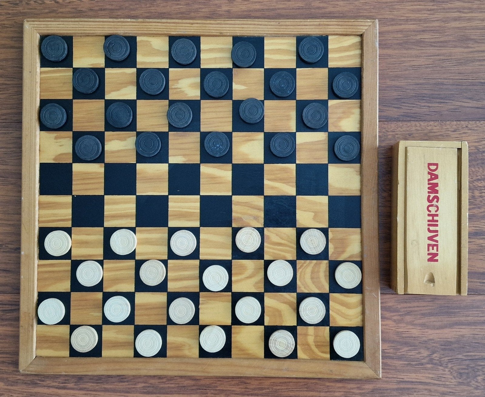 Dambord met damschijven, Een of twee spelers, Ophalen, Gebruikt