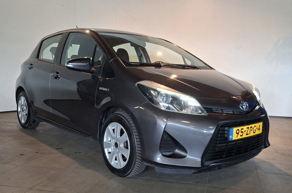 Toyota Yaris 1.5 Full Hybrid CVT 5-Drs  Airco / Trekhaak, Auto's, 1497 cc, 74 pk, Zwart, 4 cilinders