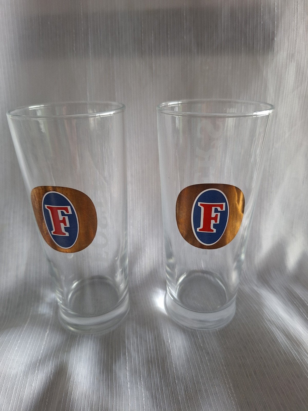 FOSTERS bier glazen 2 stuks, 0,25 l, Verzamelen, Ophalen of Verzenden, Zo goed als nieuw, Bierglas