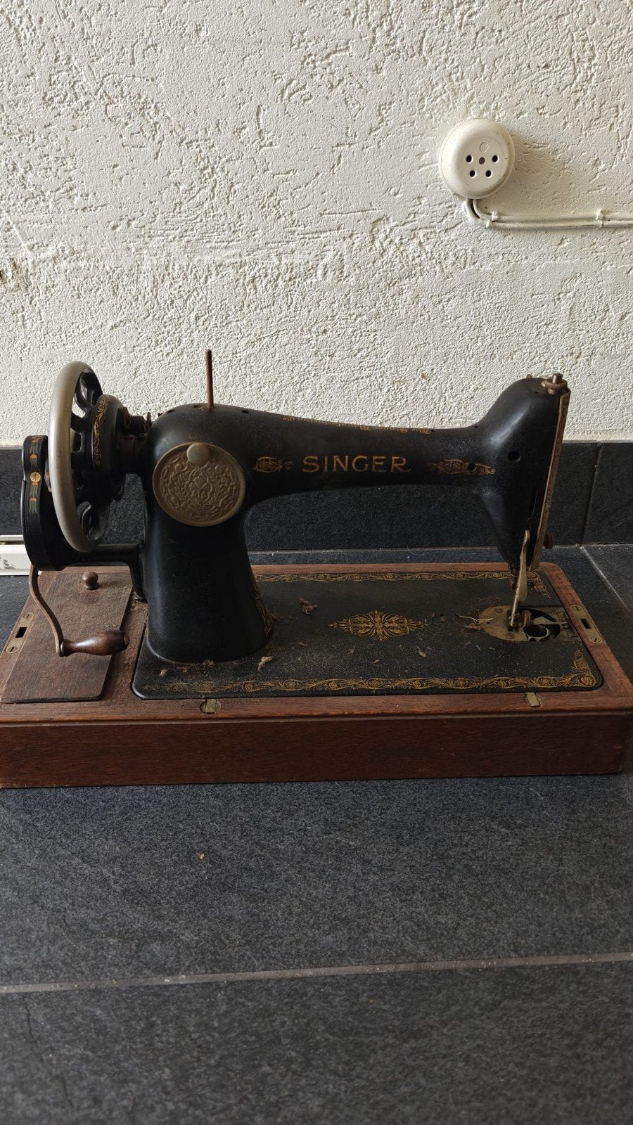 Authentieke Singer naaimachine, Ophalen