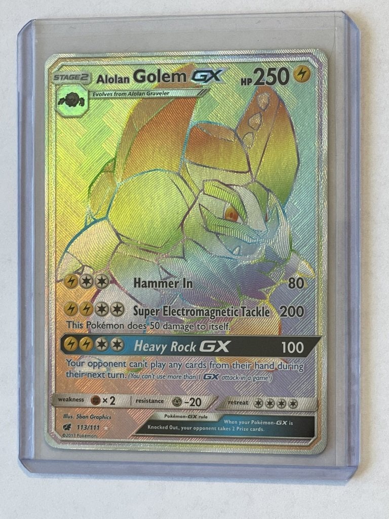 Pokémon kaart Alolan Golem GX 113/111 rainbow rare, Ophalen of Verzenden, Zo goed als nieuw, Losse kaart, Foil