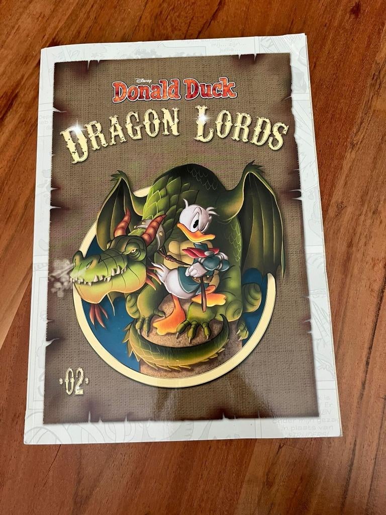 Donald Duck - Dragon Lords 2, Boeken, Eén stripboek, Ophalen of Verzenden, Zo goed als nieuw